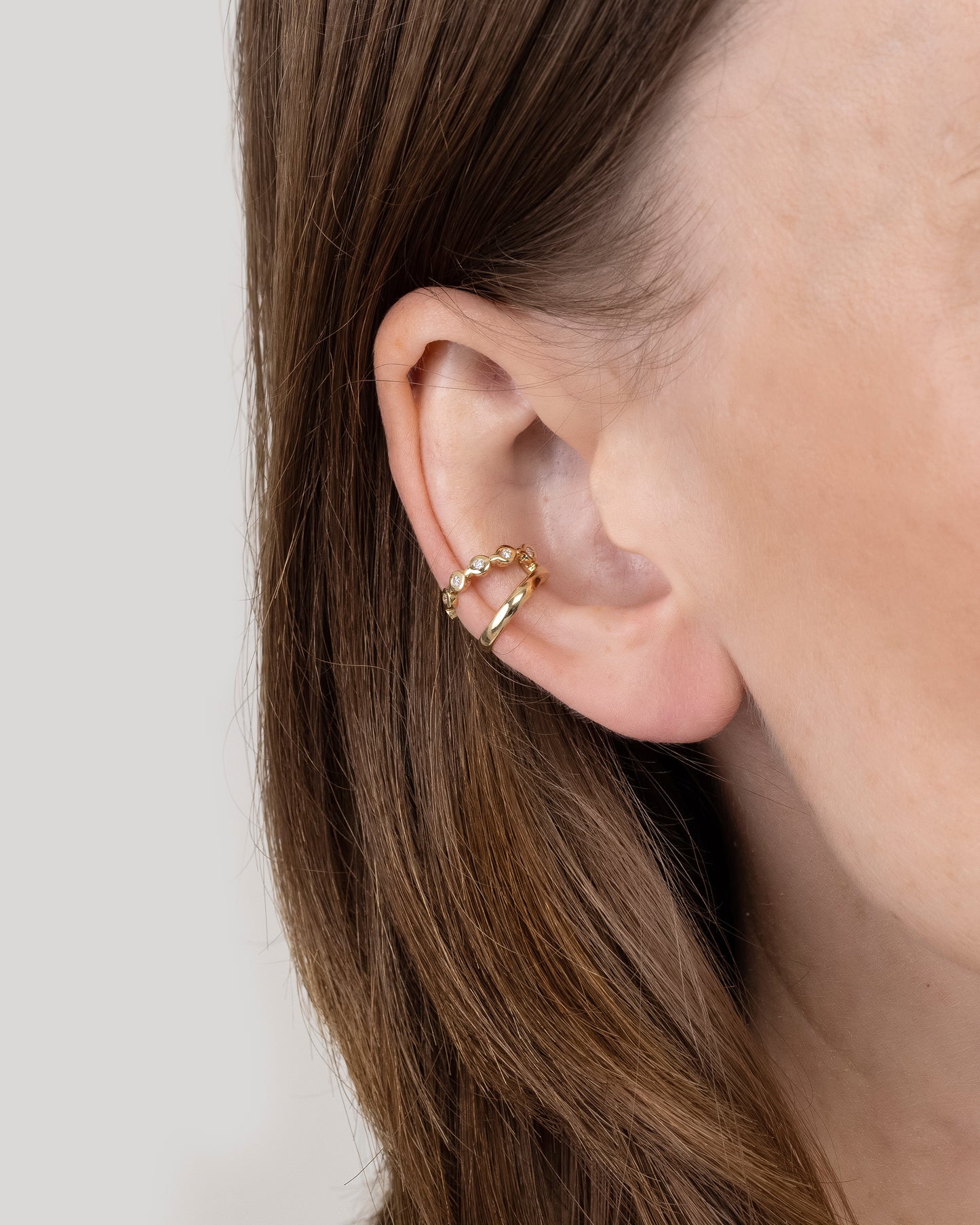Piercing Estrela Duplo em Ouro 18K e Diamantes