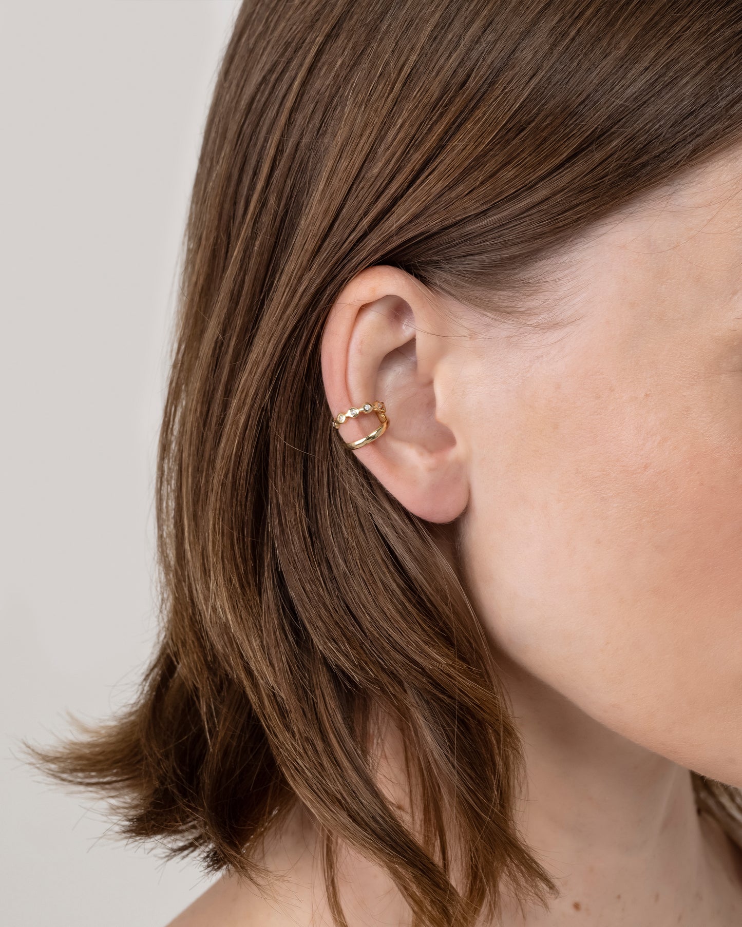 Piercing Estrela Duplo em Ouro 18K e Diamantes