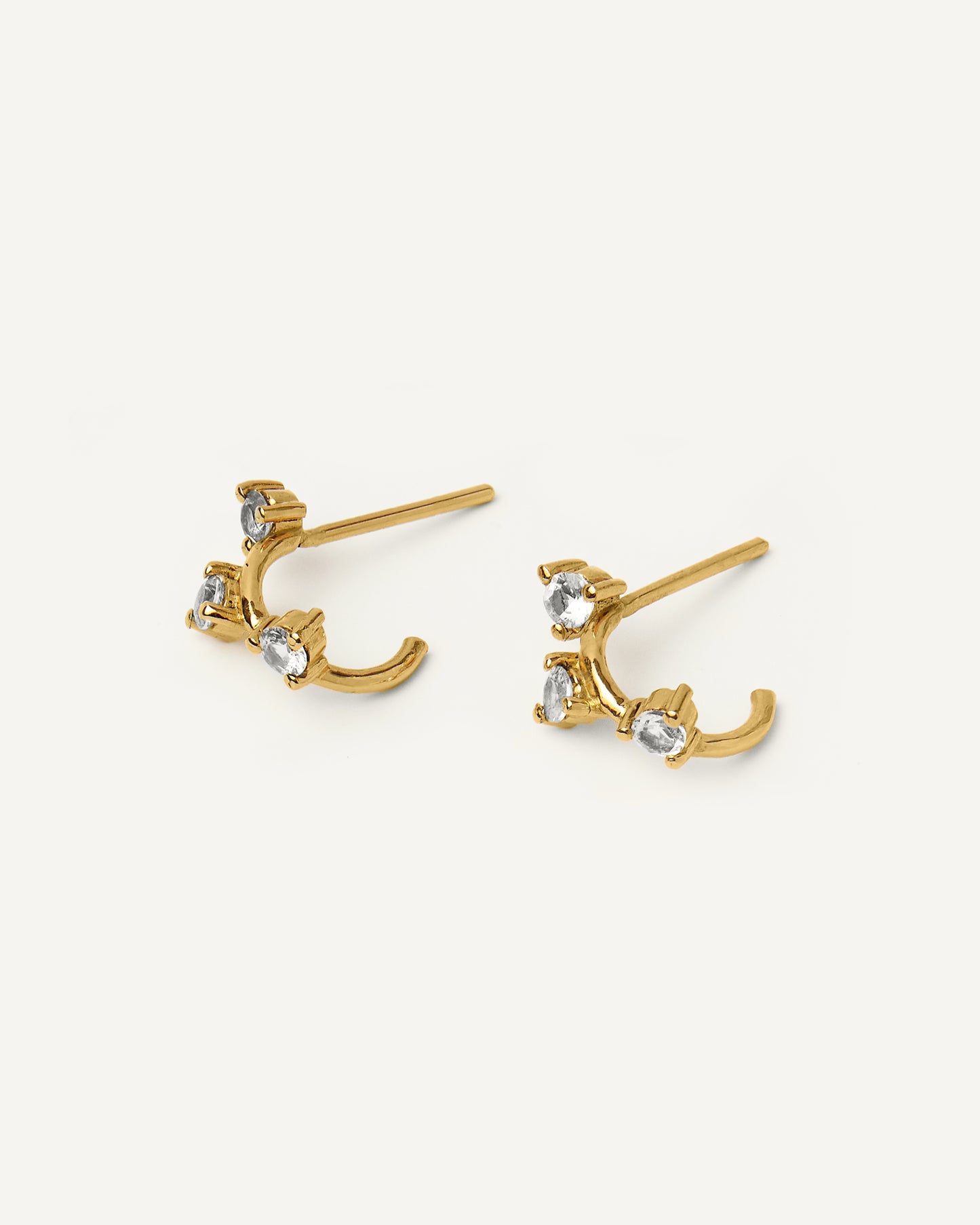 Argola Nora em Ouro 18K e Safiras Brancas
