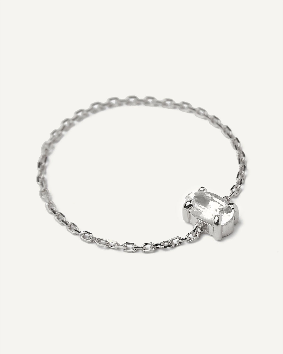 Anel Corrente Oval em Ouro Branco 18K e Safira Branca