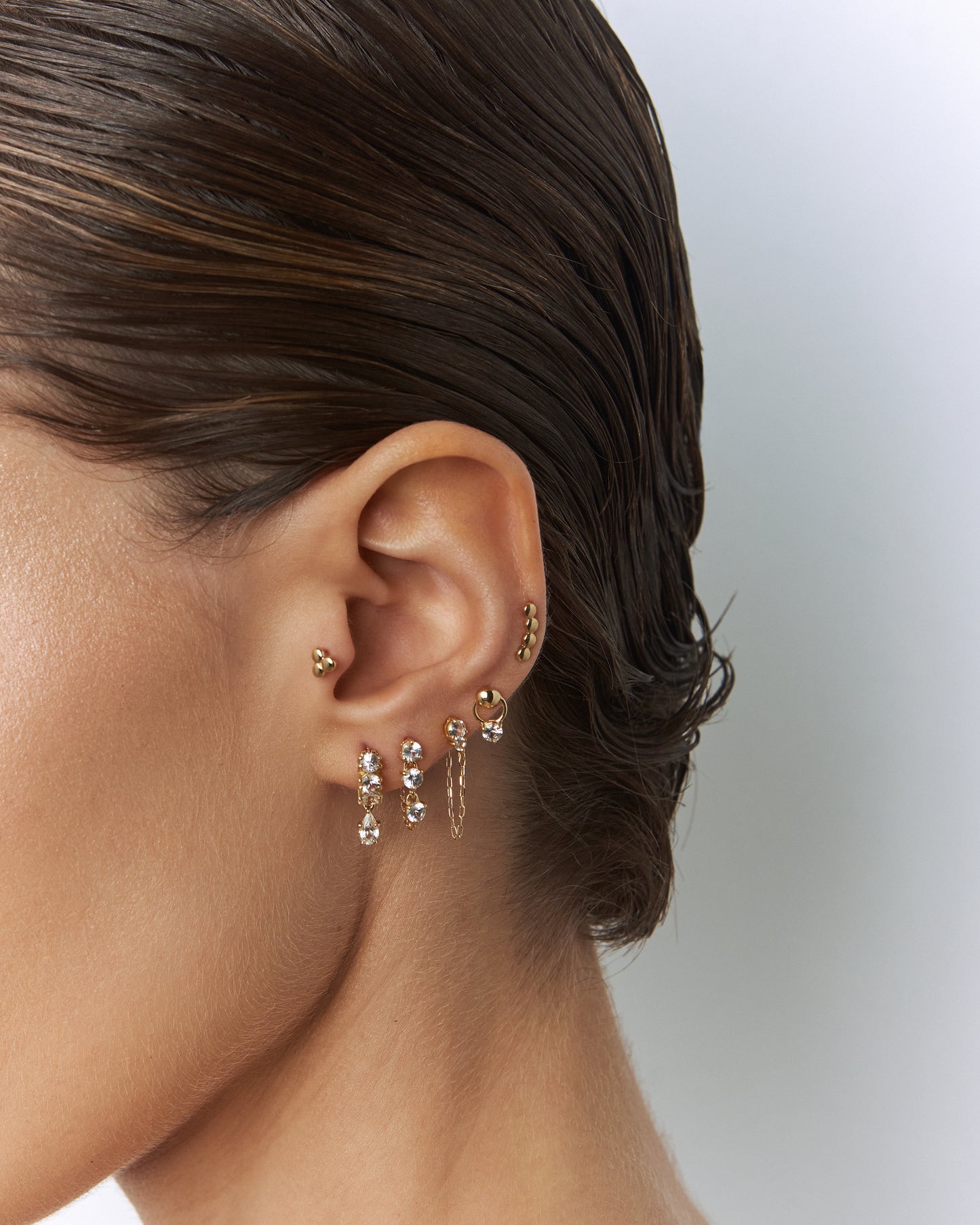 Brinco Bliss Unitário em Ouro 18k e Safira
