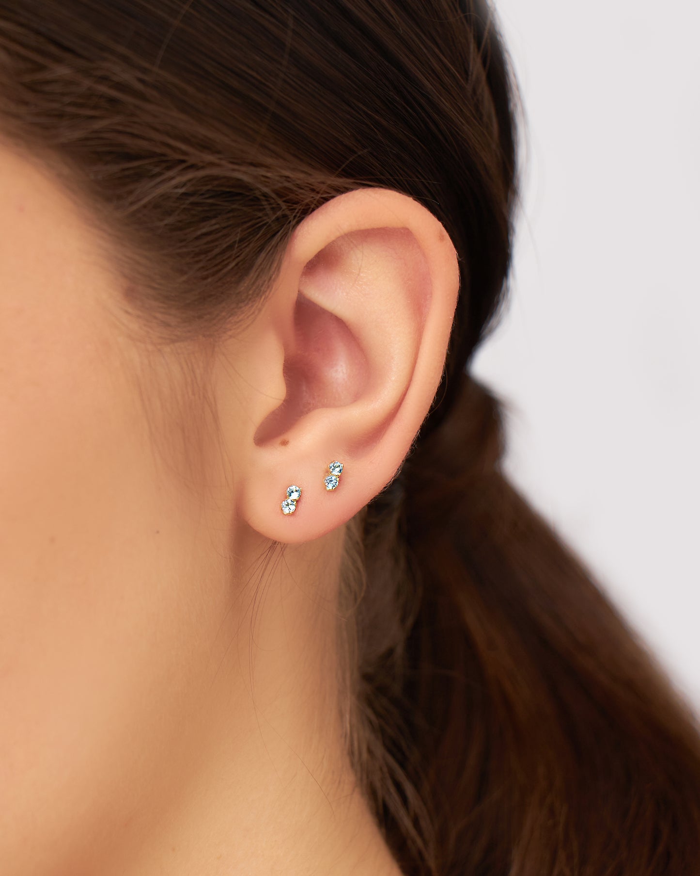 Brinco Two Petit em Ouro 18K e Topázios Azuis