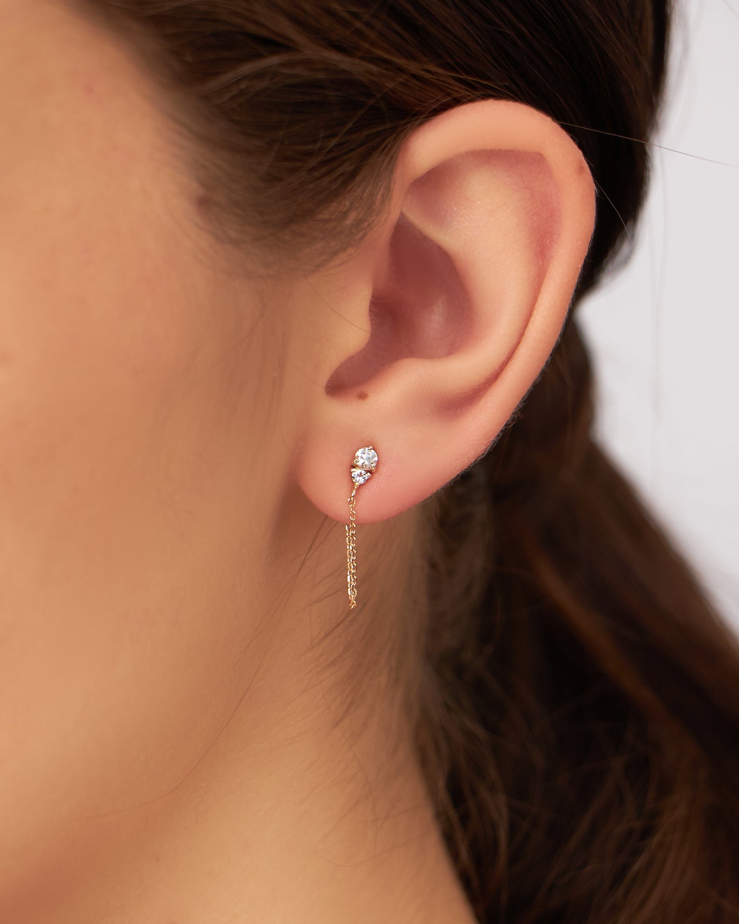 Brinco Bliss Unitário em Ouro 18k e Safira