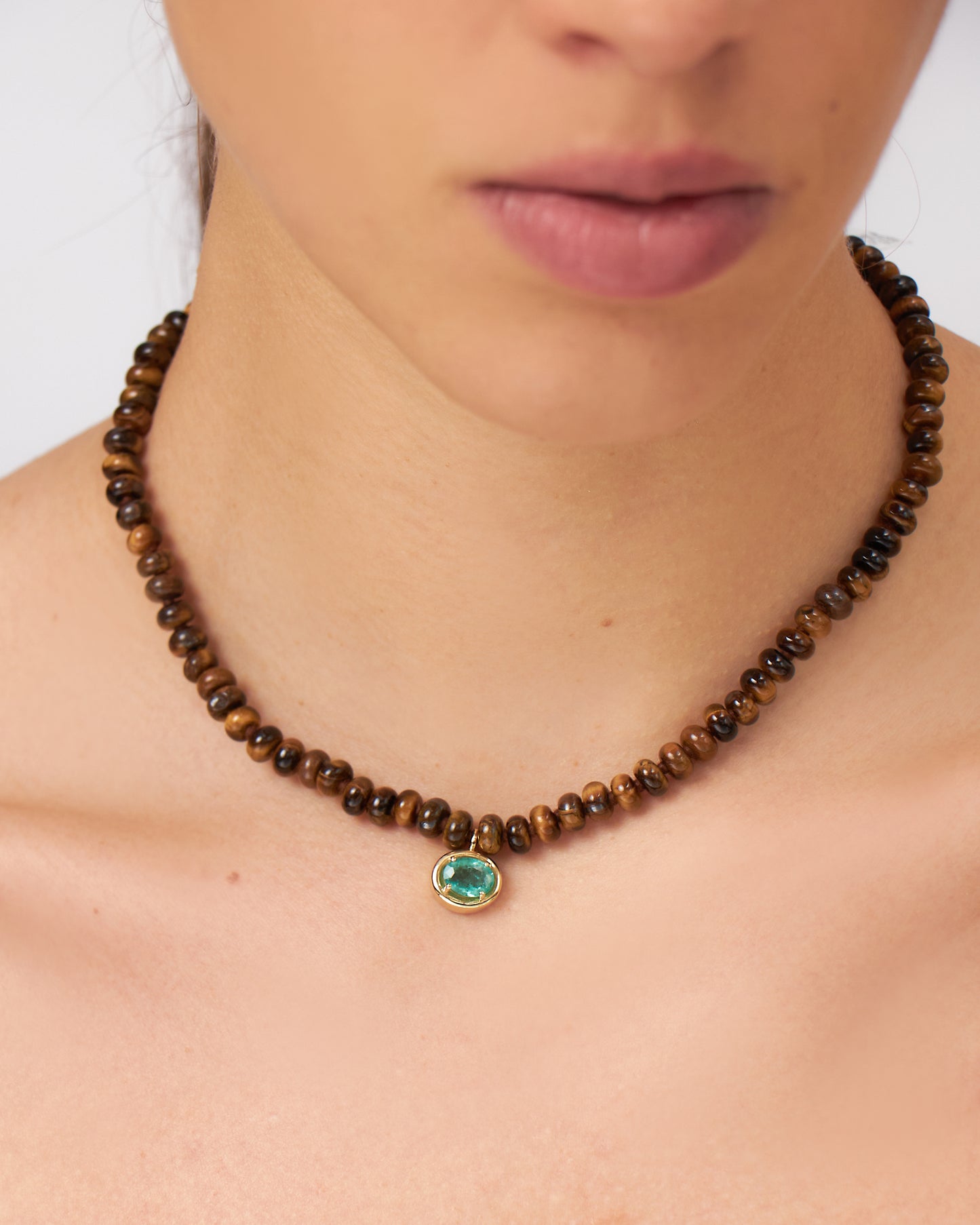 Colar Órbita Esmeralda em Ouro 18K e Olho de Tigre