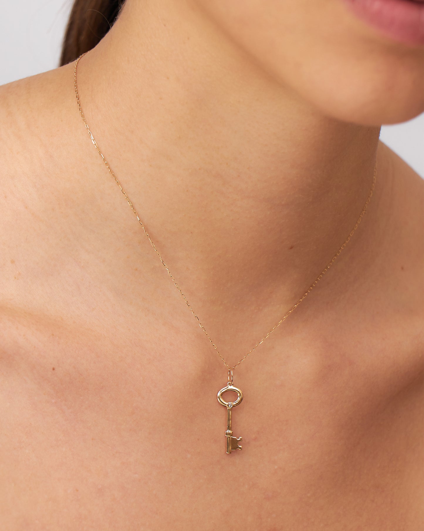 Pingente Chave Fortuna em Ouro 18K e Diamante