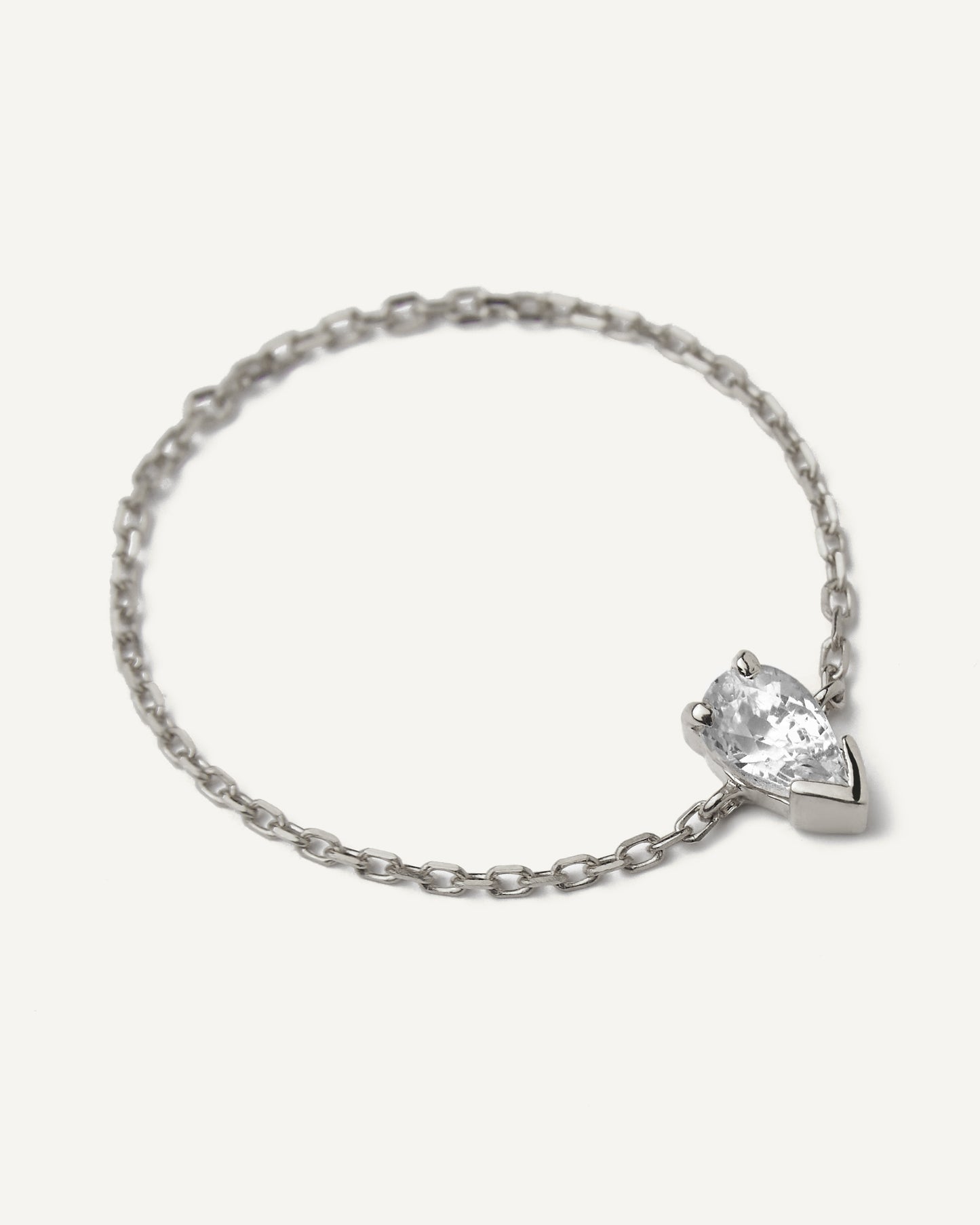 Anel Corrente Gota em Ouro Branco 18k e Safiras Brancas