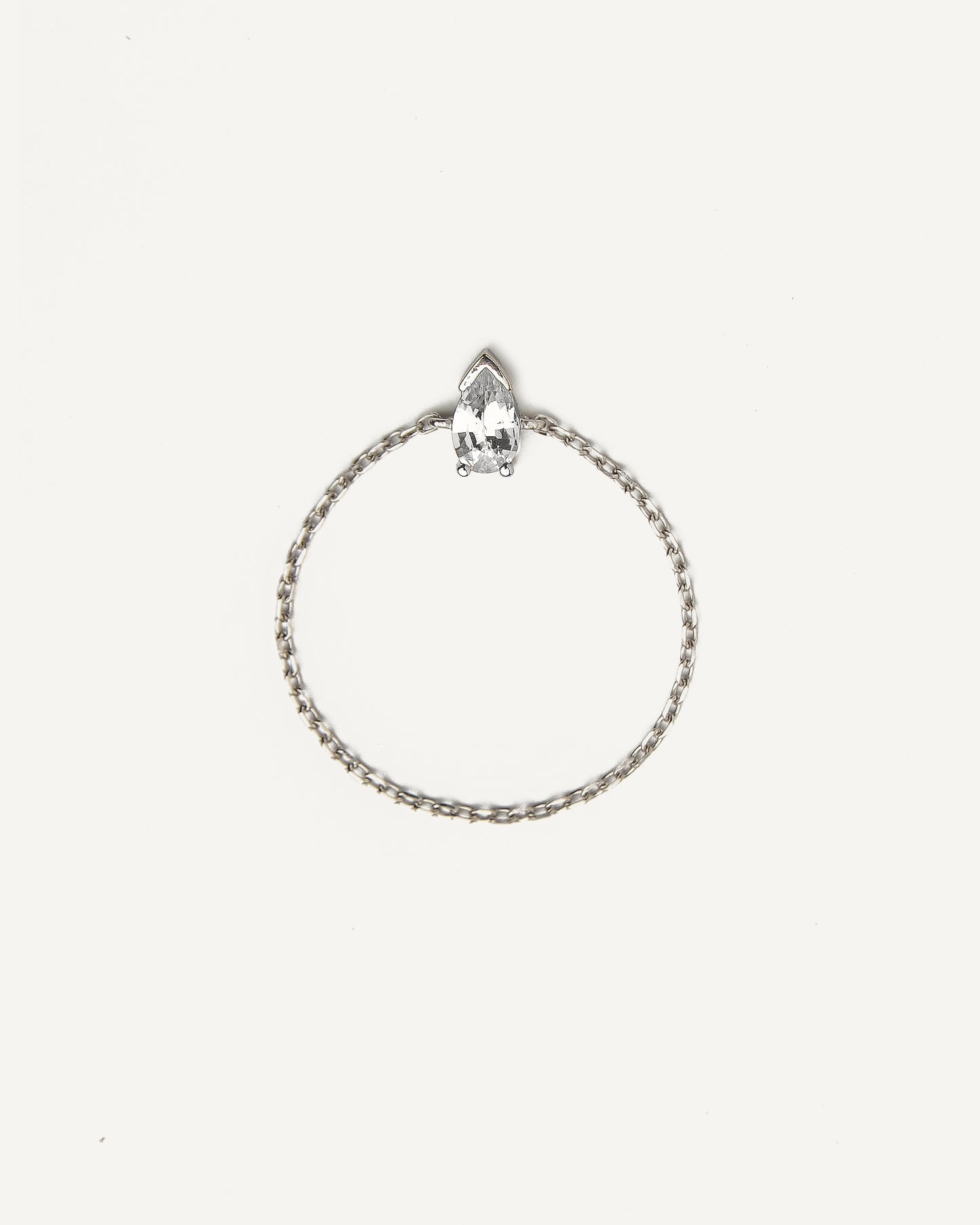 Anel Corrente Gota em Ouro Branco 18k e Safiras Brancas